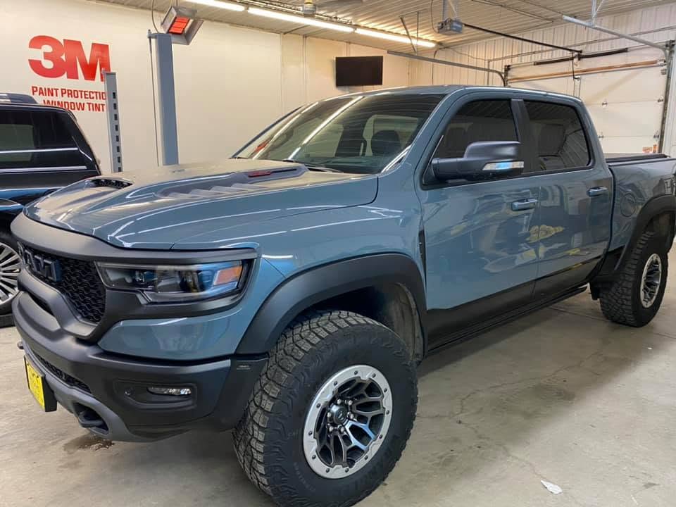 Tinted blue pickup truck inside the Executive Film workshop